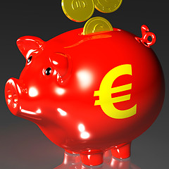 Image showing Coins Entering Piggybank Shows European Loans