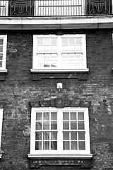 Image showing in europe london old red brick wall and      historical window