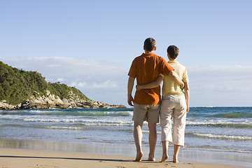 Image showing Couple walking on the beach