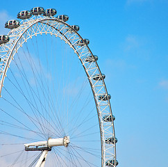 Image showing london eye in the spring sky and white clouds