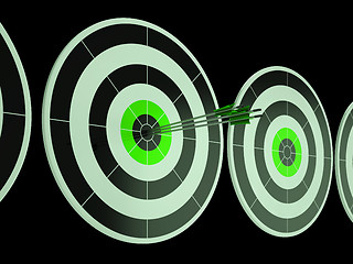 Image showing Triple Dart Shows Focused Successful Aim