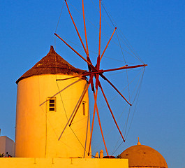 Image showing old mill in santorini greece europe  and the sky sunrise