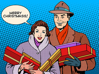 Image showing Happy couple with Christmas gifts