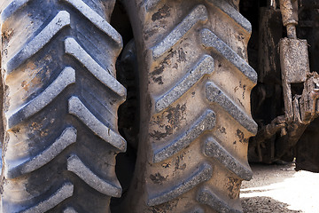 Image showing wheel tractor  . dirty wheels