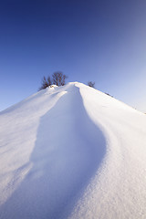 Image showing snow covered hill  