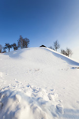 Image showing snow covered hill  