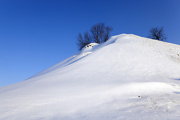 Image showing snow covered hill  