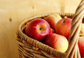 Image showing Ripe bright apples in a basket 
