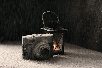 Image showing Old camera in the snowing