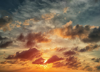 Image showing Evening sunset with orange cloud scape.