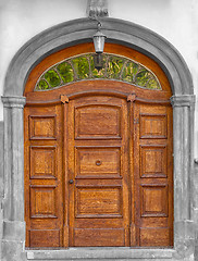 Image showing Asolid wooden hand carved timber door