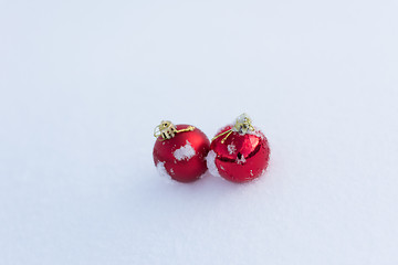 Image showing red christmas balls in fresh snow