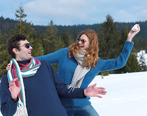 Image showing happy young couple having fun on fresh show on winter vacation