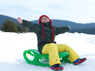 Image showing happy young boy have fun on winter vacatioin on fresh snow