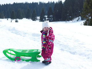 Image showing little baby girl have fun on fresh snow