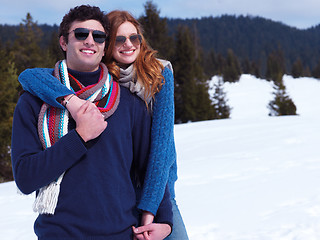 Image showing happy young couple having fun on fresh show on winter vacation