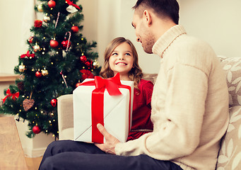 Image showing smiling father and daughter looking at each other