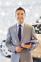 Image showing happy man at auto show or car salon