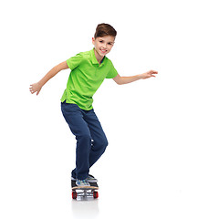 Image showing happy boy with skateboard