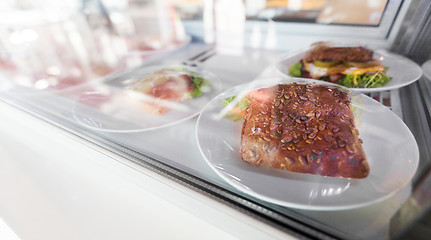 Image showing close up of sandwich in cafe showcase or store