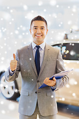 Image showing happy man at auto show or car salon