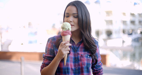 Image showing Young Girl Eating Ice Cream