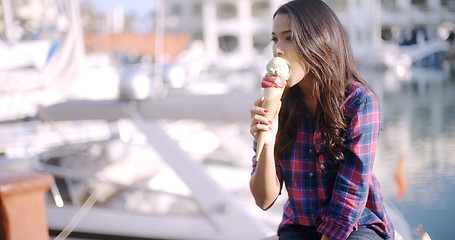 Image showing Woman Enjoying Ice Cream On Vacation