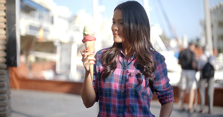 Image showing Girl Eating A Delicious Ice Cream
