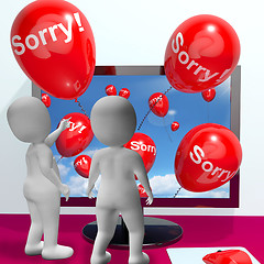 Image showing Sorry Balloons From Computer Showing Online Apology Or Remorse