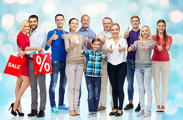 Image showing group of happy people showing thumbs up