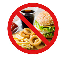 Image showing close up of fast food and drink behind no symbol