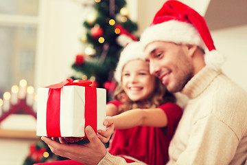 Image showing close up of father and daughter with gift box