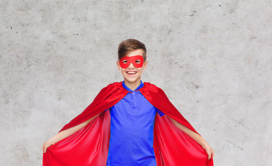 Image showing boy in red super hero cape and mask