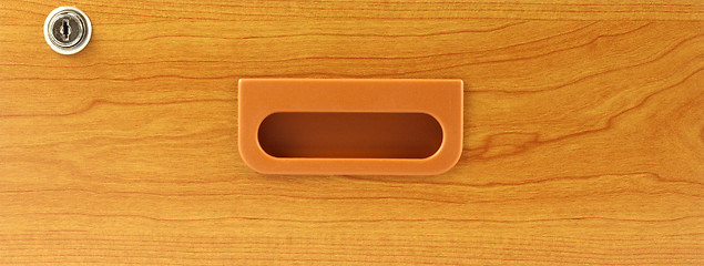 Image showing Wooden drawer with lock
