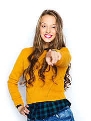 Image showing happy young woman or teen pointing finger on you