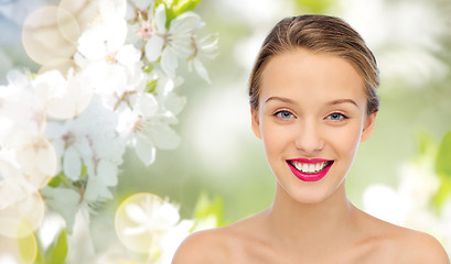 Image showing smiling young woman face and shoulders