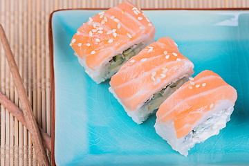 Image showing Top view to california maki sushi with salmon