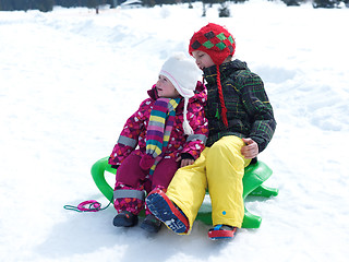 Image showing portrait of boy and baby girl on winter vacation