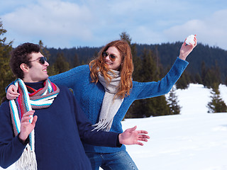 Image showing happy young couple having fun on fresh show on winter vacation