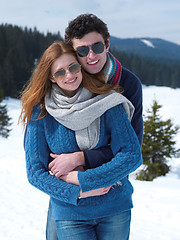 Image showing happy young couple having fun on fresh show on winter vacation