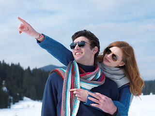 Image showing happy young couple having fun on fresh show on winter vacation