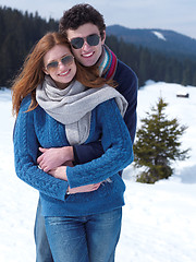 Image showing happy young couple having fun on fresh show on winter vacation