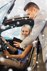 Image showing happy woman with car dealer in auto show or salon