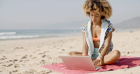 Image showing Woman With Laptop On The Summer Beach