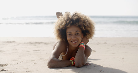 Image showing Woman In A Swimsuit Relaxing On The Sand