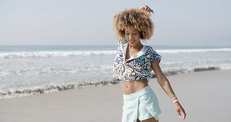 Image showing Girl Jumping With Joy On The Seashore