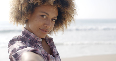 Image showing Portrait Of Young Black Woman Near The Sea.