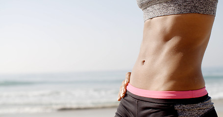 Image showing Young Fit Woman\'s Belly Outdoors In Summer