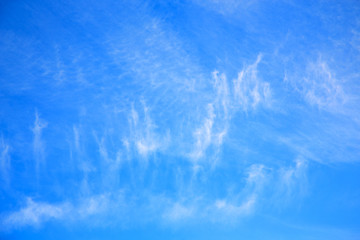 Image showing in the blue sky white soft clouds and abstract background