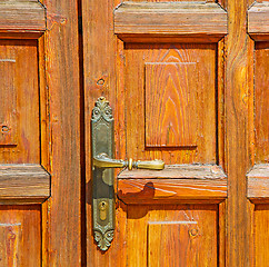 Image showing europe old in  italy  antique close brown door and rusty lock  c